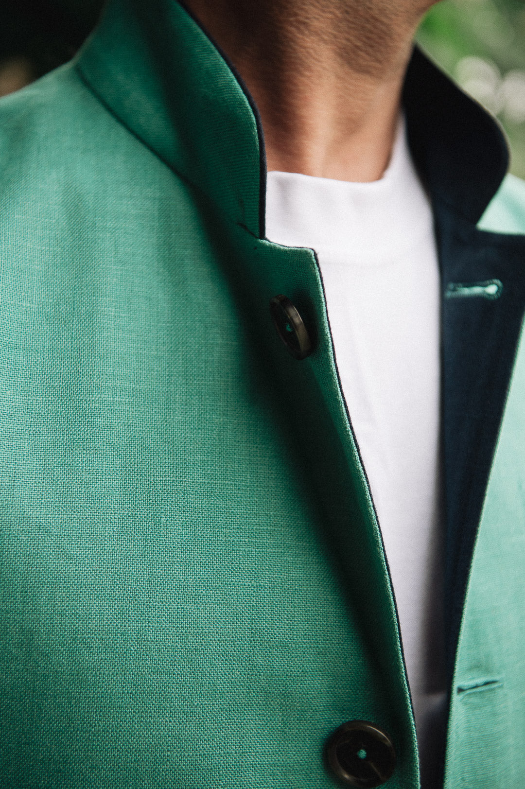 Jade green Darzi Como linen waistcoat with navy contrast lining