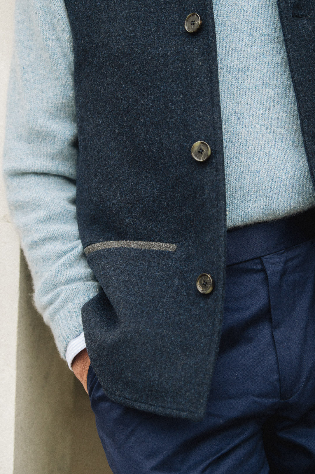 Darzi Midnight Blue merino wool waistcoat - side pocket and button detail