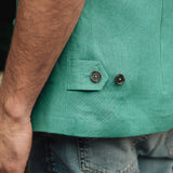 Darzi Como linen waistcoat in Jade Green - focused on side adjusters
