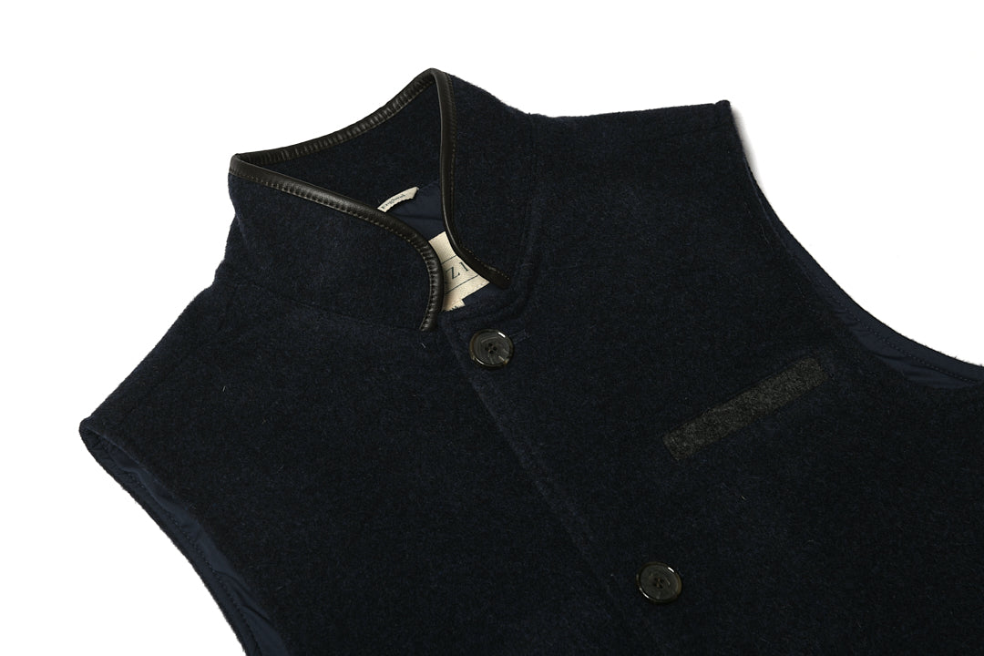 Darzi Midnight Blue merino wool waistcoat laid flat against white background