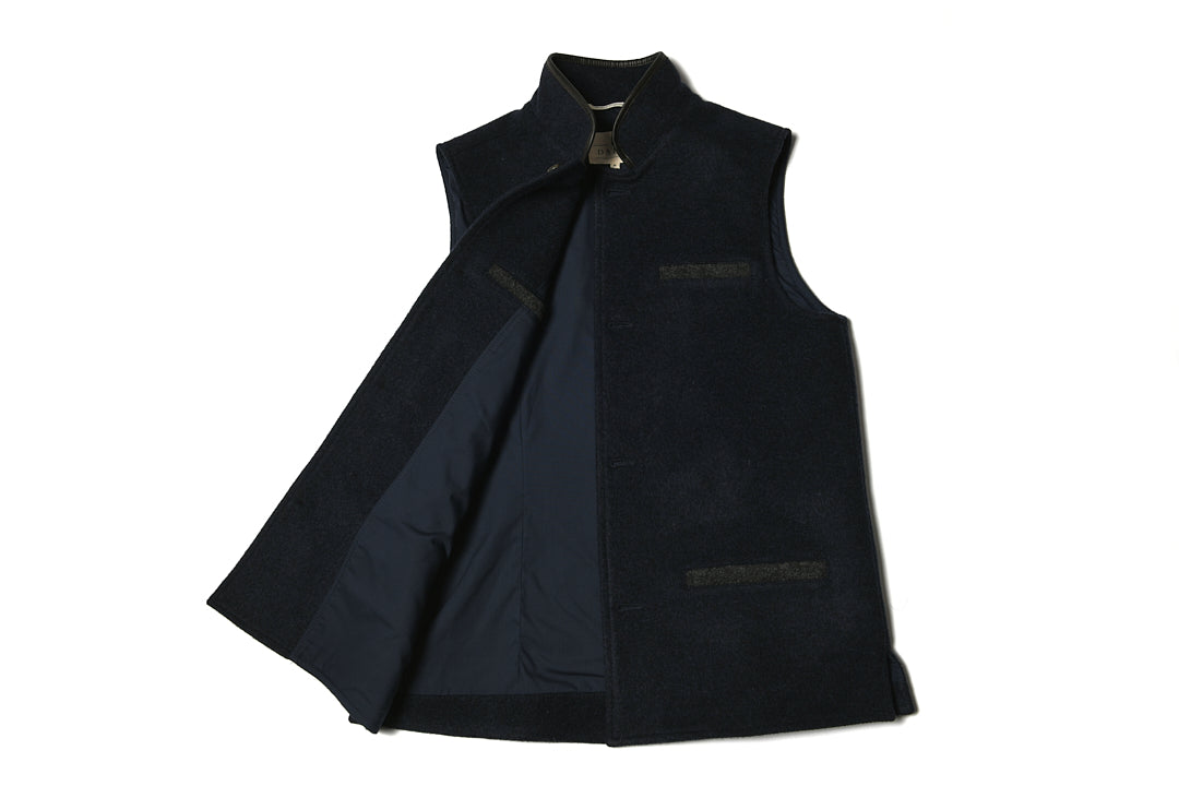 Darzi Midnight Blue merino wool waistcoat laid flat against white background with inner lining showing