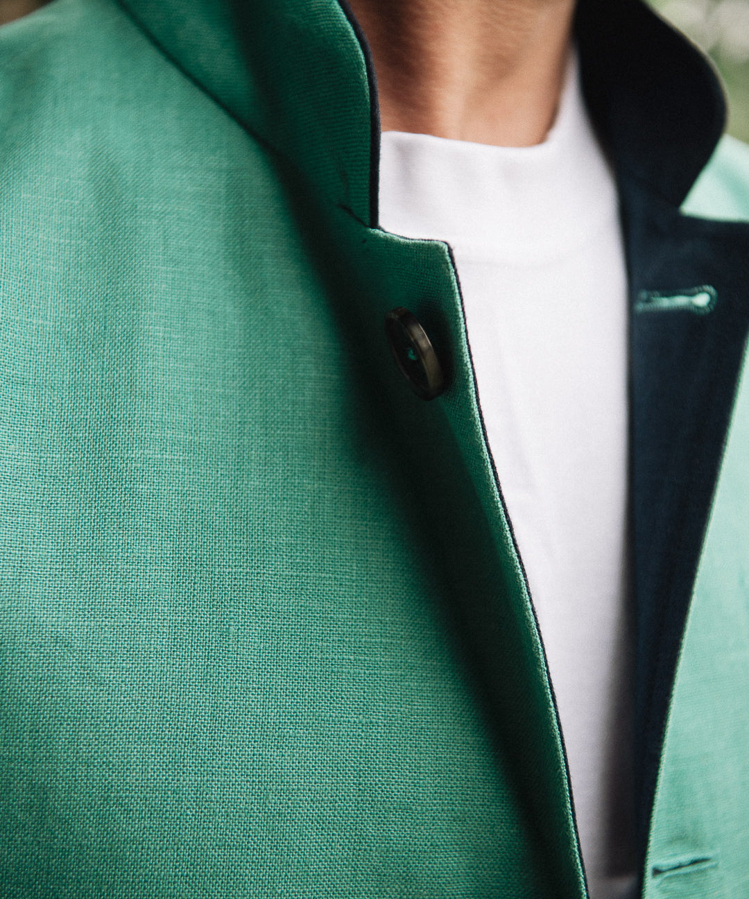 Jade green Darzi Como linen waistcoat with navy contrast lining