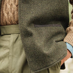 Close-up side pocket detail of Darzi Helmsley green brown twill wool waistcoat