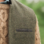 Close-up pocket detail of Darzi Helmsley green brown twill wool waistcoat
