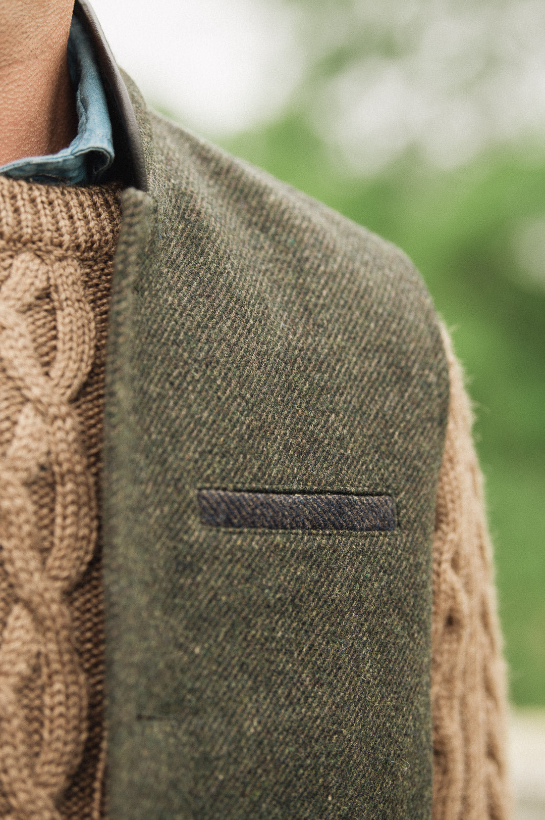 Close-up pocket detail of Darzi Helmsley green brown twill wool waistcoat