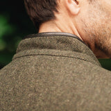 Close-up collar detail of Darzi Helmsley green brown twill wool waistcoat, shown from behind