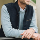Man wearing a light blue sweater and Darzi Midnight Blue merino wool waistcoat 