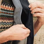 Men's Darzi navy Hillgate linen vest with close-up of concealed inside breast pocket opening