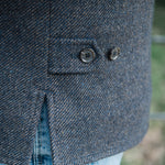 Close-up of waist adjuster detail on Darzi Helmsley wool waistcoat in Blue Brown Twill 