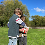 Boys wearing Little Darzi wool gilets